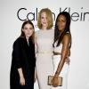 Rooney Mara, Nicole Kidman et Naomie Harris lors du défilé Calvin Klein printemps-été 2014 aux studios Spring. New York, le 12 septembre 2013.
