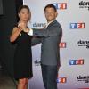 Sandrine Quetier et Christophe Beaugrand posent lors de la présentation du casting de la saison 4 de "Danse avec les stars", à Paris le 10 septembre 2013.