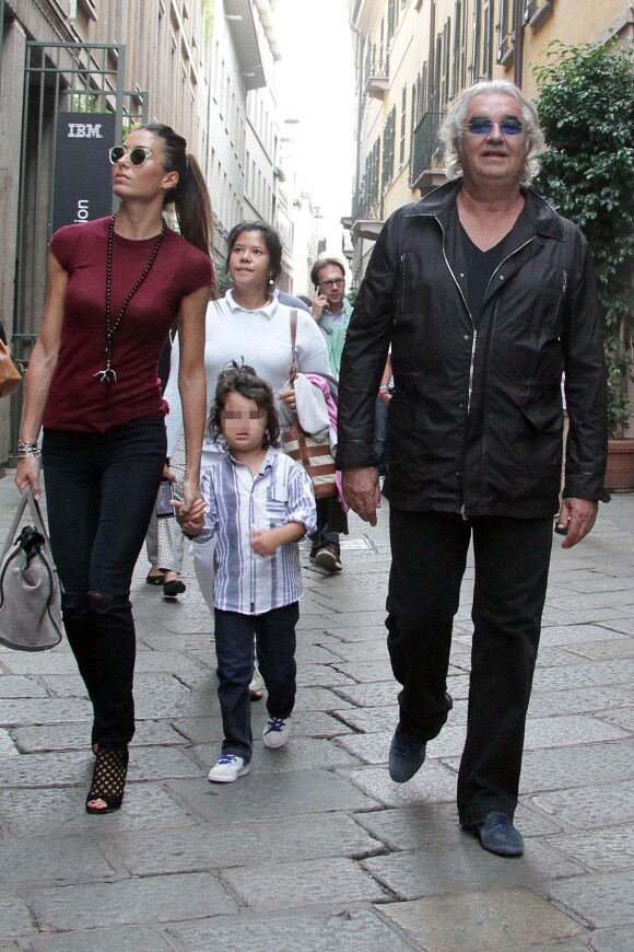 Flavio Briatore fait du shopping à Milan avec sa femme Elisabetta Gregoraci et leur fils Nathan Falco (3 ans) le 21 septembre 2013.