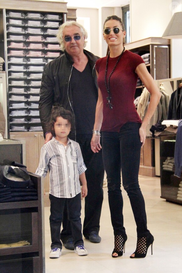 Flavio Briatore fait du shopping à Milan avec son épouse Elisabetta Gregoraci et leur fils Nathan Falco (3 ans) le 21 septembre 2013.