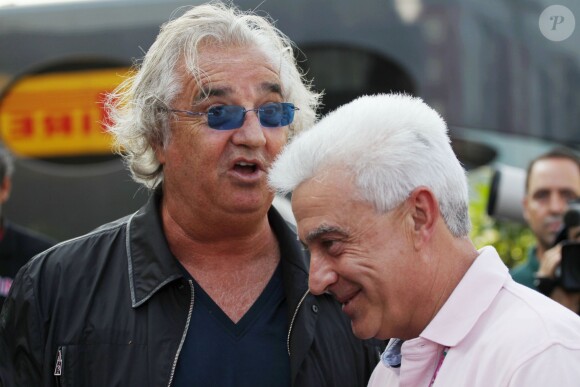 Flavio Briatore et le père de Fernando Alonso, Jose Luis Alonso, pendant le Grand Prix de Formule 1 d'Italie à Monza, le 8 septembre 2013