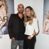 Jérémy Olivier, alias DJ Jey Didarko et sa femme Clara Morgane à la soirée de lancement du nouveau calendrier 2014 de Clara Morgane à la galerie "Hug" à Paris, le 24 septembre 2013.