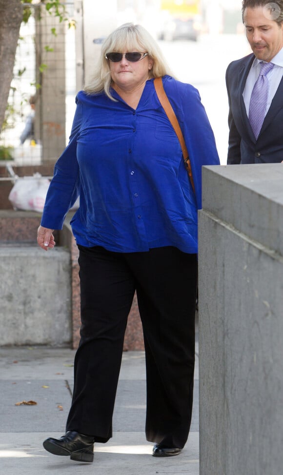 Debbie Rowe, l'ex-femme de Michael Jackson et mère des deux aînés, arrive au tribunal de Los Angeles, le 14 août 2013.