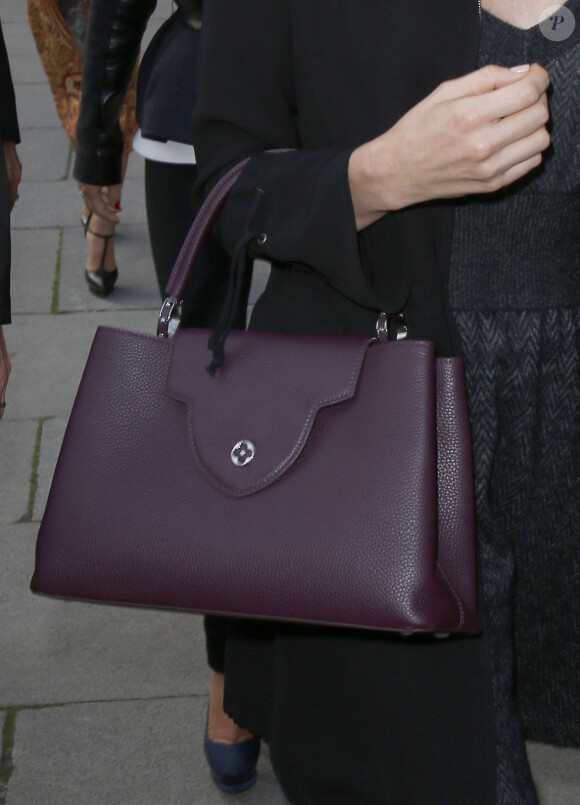 La princesse Charlene de Monaco arrive au défilé Louis Vuitton le 2 octobre 2013