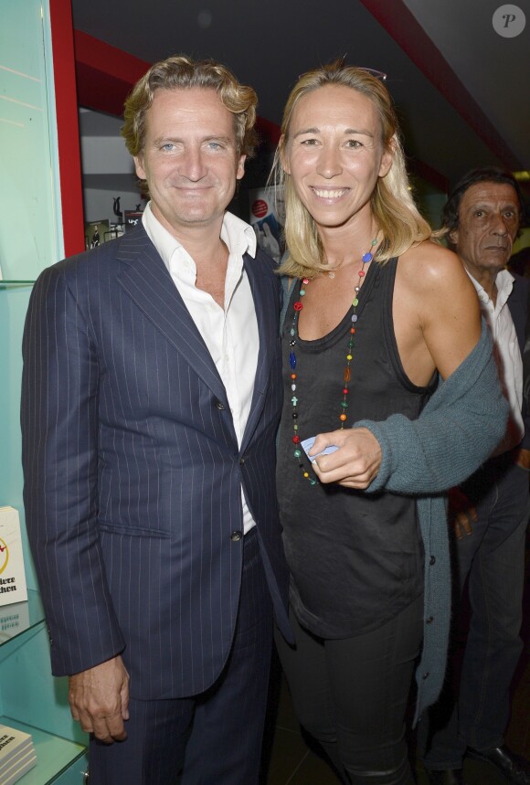 Charles Beigbeder et sa femme Carine à la générale du spectacle "Spamalot" à Bobino, à Paris. Le 3 octobre 2013.