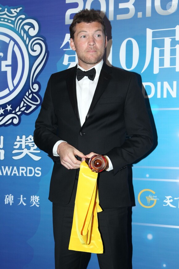 Sam Worthington lors de la cérémonie des Huading Awards à Macao., le 7 octobre 2013.