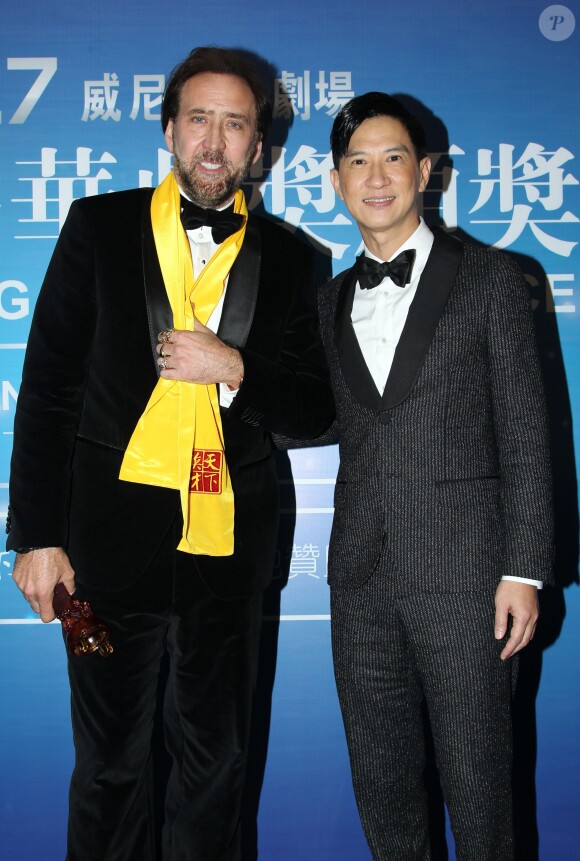 Nicolas Cage, Nick Cheung lors de la cérémonie des Huading Awards à Macao., le 7 octobre 2013.