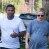 Exclusif - Alfonso Ribeiro se promène avec sa femme Angela Unkrich, enceinte, à Toluca Lake, le 8 octobre 2013.
