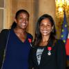 Marie-José Pérec et Christine Arron lors de la remise des insignes de la Légion d'honneur et de l'Ordre national du Mérite par François Hollande au Palais de l'Elysée le 9 octobre 2013
