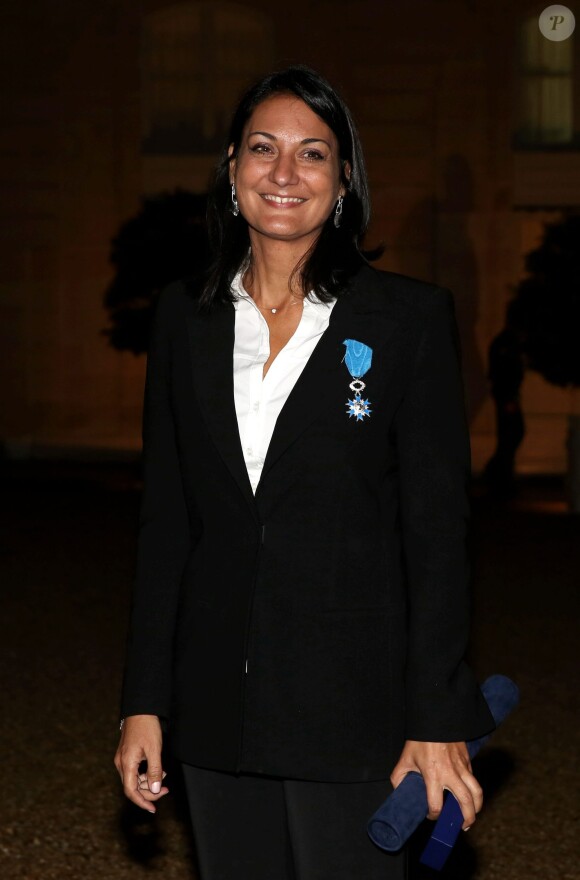Sophie Kamoun lors de la remise des insignes de la Légion d'honneur et de l'Ordre national du Mérite par François Hollande au Palais de l'Elysée le 9 octobre 2013