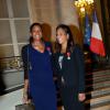 Marie-José Pérec et Christine Arron lors de la remise des insignes de la Légion d'honneur et de l'Ordre national du Mérite par François Hollande au Palais de l'Elysée le 9 octobre 2013