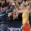 Rory McIlroy et sa belle Caroline Wozniacki lors d'un match exhibition face à Maria Sharapova au Madison Square Garden de New York, le 5 mars 2012