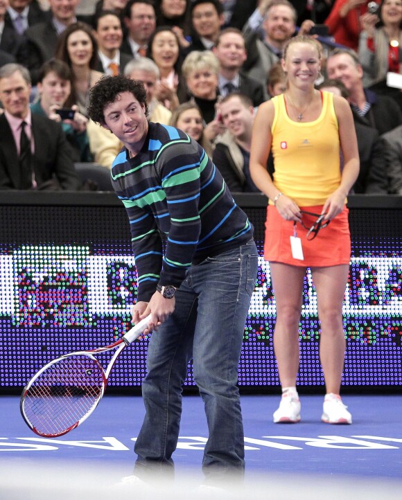 Rory McIlroy et sa belle Caroline Wozniacki lors d'un match exhibition face à Maria Sharapova au Madison Square Garden de New York, le 5 mars 2012. Le couple serait séparé depuis début septembre 2013...