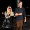 Jessica Simpson et son fiancé Eric Johnson arrivent à l'aéroport de Los Angeles, le 13 octobre 2013.