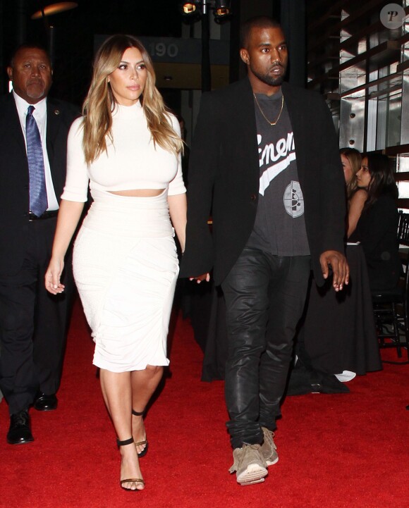 Kim Kardashian et son fiancé Kanye West le 24 octobre 2013