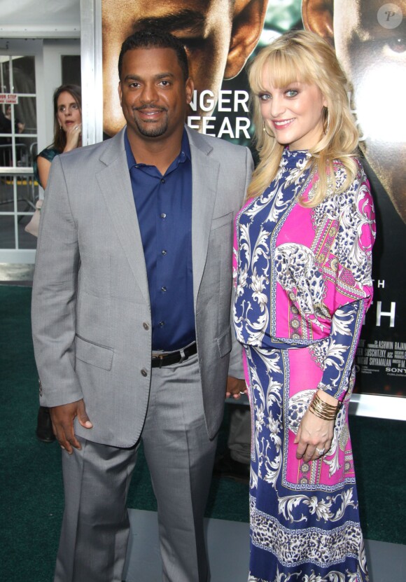 Alfonso Ribeiro et son épouse Angela lors de la première du film After Earth au théâtre Ziegfeld à New York, le 29 mai 2013