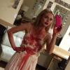 Lindsay Lohan prend la pose en Carrie pour Halloween, le 31 octobre 2013.