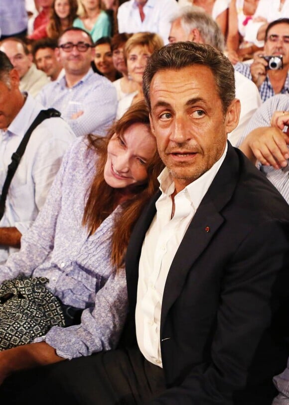 Nicolas Sarkozy et son épouse Carla Bruni au concert de Julien Clerc dans le cadre du festival de Ramatuelle le 3 août 2013.