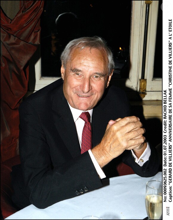 Gérard de Villiers à l'anniversaire de sa femme Christine, à Paris, le 1er juillet 2003.