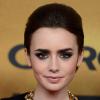 La it-list beauté pour les fêtes de fin d'année : un smoky eye glamour comme Lily Collins