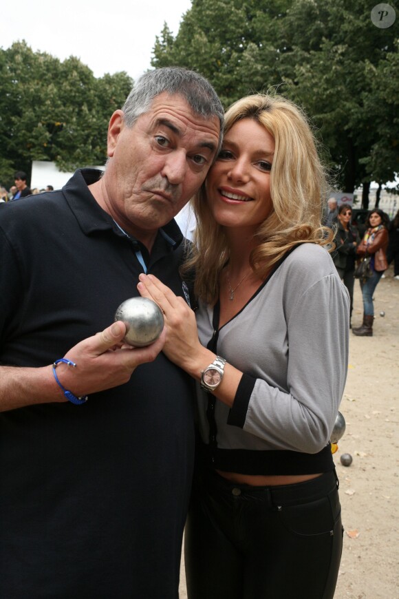 Jean-Marie Bigard et sa femme Lola à Paris le 29 septembre 2013.