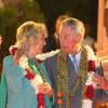 Le prince Charles et son épouse Camilla lors de la visite de la ville sacrée de Rishikesh, sur les rives du Gange, où ils ont assisté et participé à une cérémonie religieuse, le 6 novembre 2013, lors d'un séjour officiel de neuf jours en Inde et au Sri Lanka