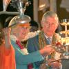 Le prince Charles et son épouse Camilla lors de la visite de la ville sacrée de Rishikesh, sur les rives du Gange, où ils ont assisté et participé à une cérémonie religieuse, le 6 novembre 2013, lors d'un séjour officiel de neuf jours en Inde et au Sri Lanka