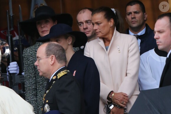 Le prince Albert de Monaco, la princesse Charlene et la princesse Stephanie de Monaco à la sortie de la cérémonie du Te Deum à la cathédrale Notre-Dame-Immaculée, lors de la Fête nationale à Monaco. Le 19 novembre 2013.