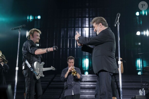 Exclusif - Johnny Hallyday, avec Eddy Mitchell, en concert au Palais Omnisports de Paris Bercy pour son 70e anniversaire dans le cadre du "Born Rocker Tour", le 15 juin 2013.