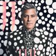 George Clooney, habillé d'un costume Giorgio Armani, pose en couverture du magazine W. Numéro de décembre/janvier 2014. Photo par Emma Summerton. Art par Yayoi Kusama.