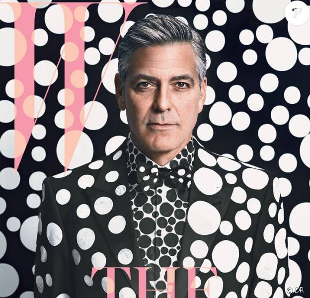 George Clooney, habillé d'un costume Giorgio Armani, pose en couverture du magazine W. Numéro de décembre/janvier 2014. Photo par Emma Summerton. Art par Yayoi Kusama.
