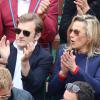 Laurence Ferrari et son mari Renaud Capuçon dans les tribunes du tournoi de Roland-Garros, le 9 juin 2013.