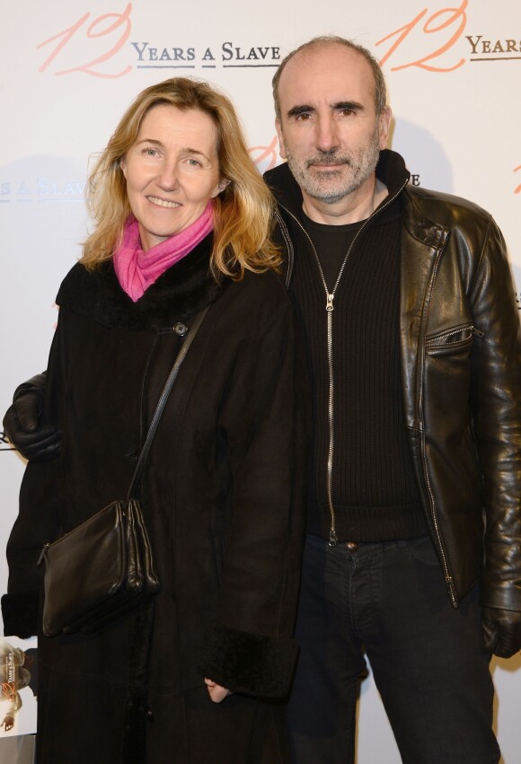 Sylvie Bourgeois Harel et Philippe Harel lors de la première du film 12 Years a Slave à l'UGC Normandie, Paris, le 11 décembre 2013.