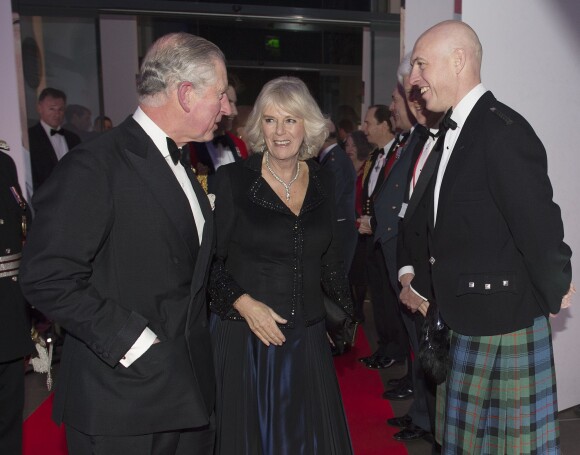 Le prince Charles et son épouse Camilla Parker Bowles, duchesse de Cornouilles, présidaient la cérémonie des Sun Military Awards récompensant l'héroïsme des troupes, le 11 décembre 2013 au Musée National de la Marine, à Londres.
