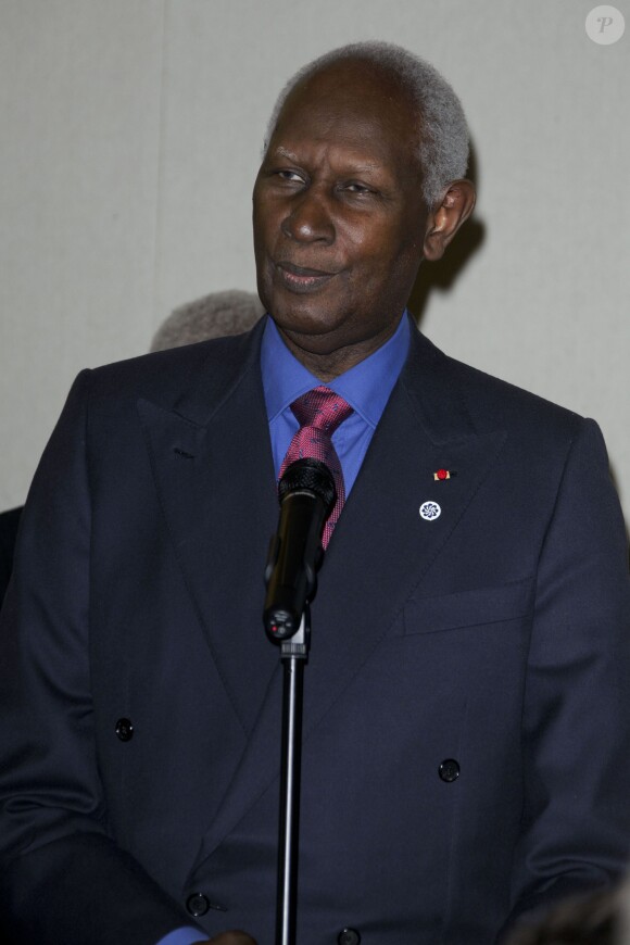 Abdou Diouf -lors de l'intronisation de l'artiste sénégalais Ousmane Sow à l'Académie des beaux-arts à Paris le 11 decembre 2013.