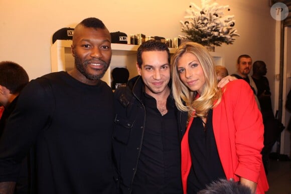 Exclusif - Djibril Cissé, Benjamin Morgaine et sa femme Elodie à l'inauguration de la boutique éphémère Mr Lenoir, marque du footballeur, à la Galerie RTR à Paris, le 13 decembre 2013.