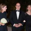 Le prince Albert de Monaco et la princesse Caroline avec Charlotte Casiraghi, enceinte, le 17 septembre 2013 lors d'un dîner de bienfaisance à la Villa Paloma.