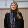 La princesse Madeleine de Suède, enceinte de six mois, aux Ecuries royales à Stockholm le 19 décembre 2013 pour la remise d'une bourse de la Fédération équestre suédoise.