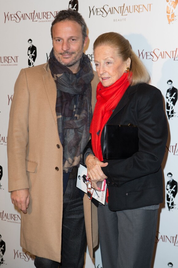 Olivier Bialobos et Doris Brynner à la première d'Yves Saint Laurent à Paris, le 19 décembre 2013.