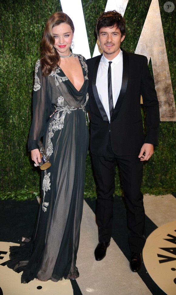 Miranda Kerr, exquise en robe haute couture Valentino et son mari de l'époque Orlando Bloom, assistent à l'after-party des Oscars du magazine Vanity Fair. Los Angeles, le 24 février 2013.