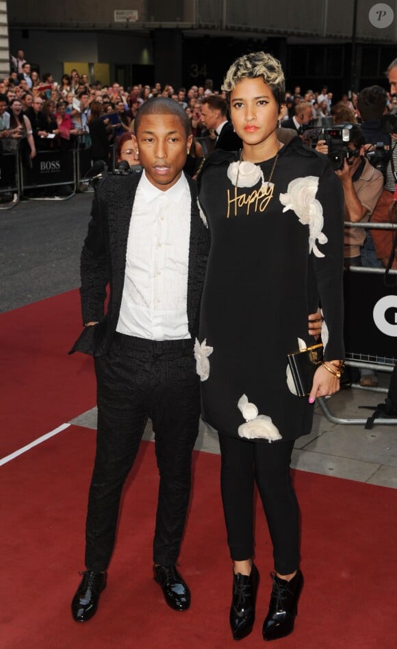 Pharrell Williams et Helen Lasichanh lors des GQ Men of the Year Awards. Londres, le 3 septembre 2013.