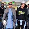 Pharrell Williams et Helen Lasichanh à l'aéroport d'Heathrow à Londres, le 4 septembre 2013.
