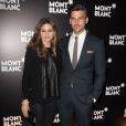 Olivia Palermo et Johannes Huebl assistent à l'ouverture d'une nouvelle boutique Mont Blanc à New York. Le 22 octobre 2013.