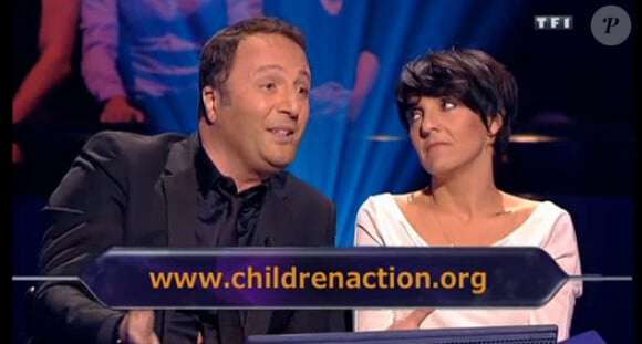 Arthur et Florence Foresti dans Qui veut gagner des millions? sur TF1 le samedi 21 décembre 2013