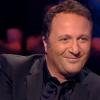 Arthur, ému, fait un don de 40 000 euros à l'association Children Action dans Qui veut gagner des millions? sur TF1 le samedi 21 décembre 2013