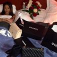 Nabilla entourée de sacs Chanel mais visiblement déprimée (Instagram)