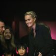 Exclusif - Laeticia Hallyday avec ses filles Jade et Joy au Trianon pour le concert caritatif de Johnny Hallyday le 15 décembre 2013 à Paris.