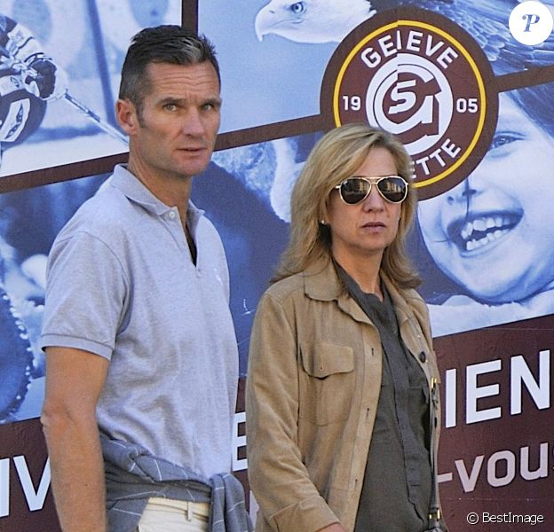 Cristina d'Espagne avec son mari Iñaki Urdangarin à Genève le 3 septembre 2013. Le 6 janvier 2014, la fille cadette du roi a été mise en examen dans l'affaire Noos, deux ans après l'inculpation de son époux.