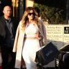 Khloe Kardashian a emprunté le look de sa soeur Kim, de la tenue aux cheveux blonds ! Ici, elle fait du shopping à Los Angeles le 18 janvier 2014