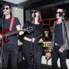 Macaulay Culkin est en concert avec son nouveau groupe "Pizza Underground" au magasin "Moscot Eyeglass" à New York, le 23 janvier 2014.